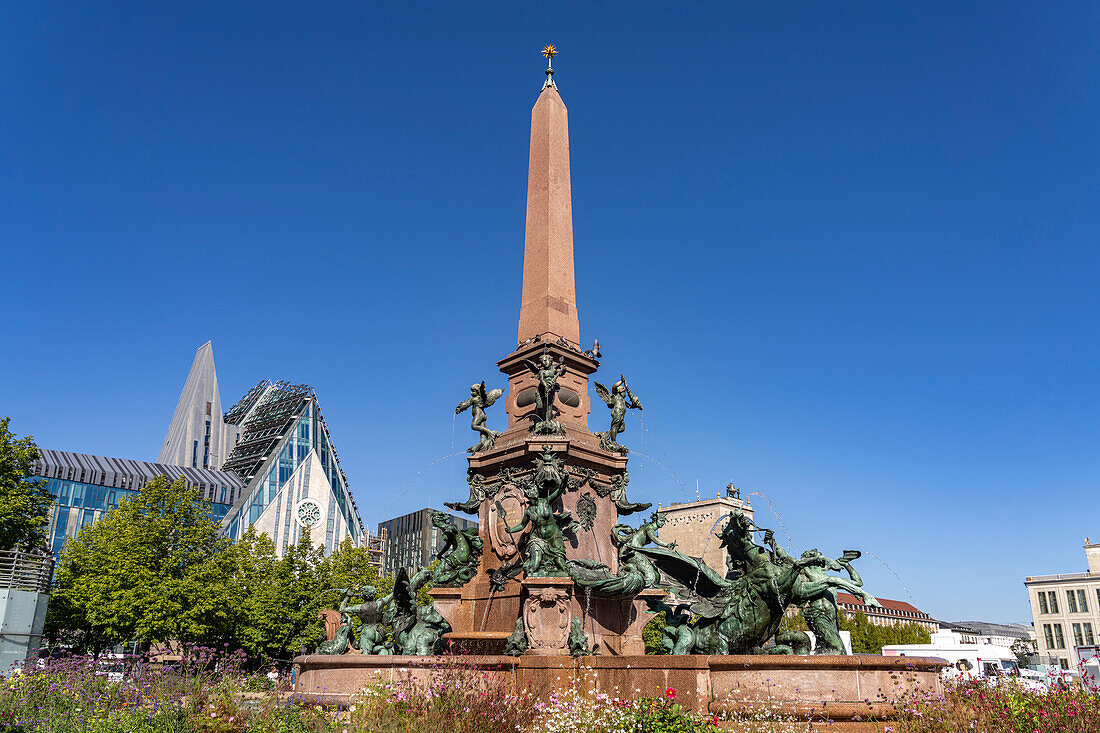 The Mendebrunnen and the modern Augusteum of the University of Leipzig on Augustusplatz, Leipzig, Saxony, Germany