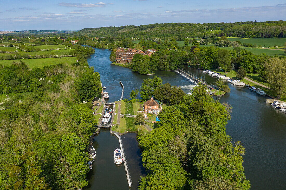 Aerial view of a Le Boat Horizon 4 houseboat in Temple Lock along the River Thames with weir, Temple, near Marlow, Buckinghamshire, England, United Kingdom