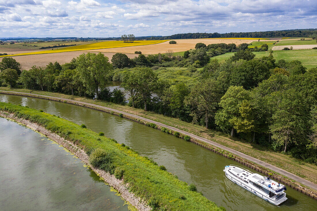 Aerial view of a Le Boat Horizon 5 houseboat on the Canal de la Marne au Rhin with the lake Le Petit Étang, Gondrexange, Moselle, France