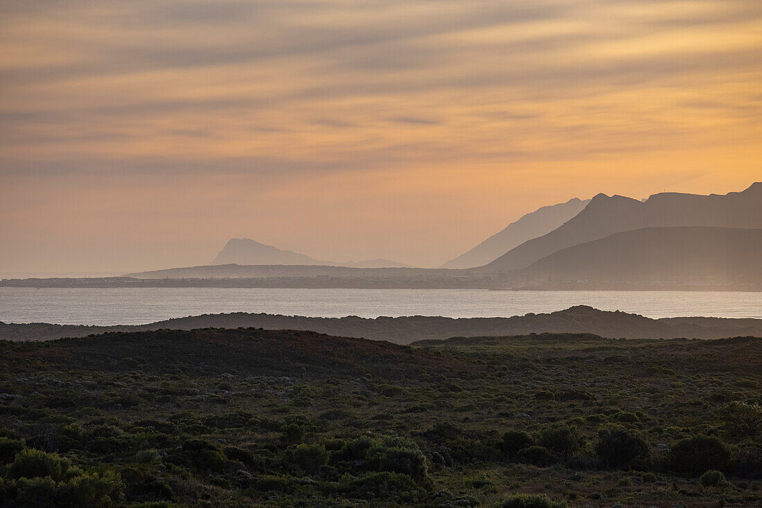 Walker Bay Nature Reserve and mountains of Maanschynkop Nature Reserve at sunset, Stanford, Western Cape, South Africa