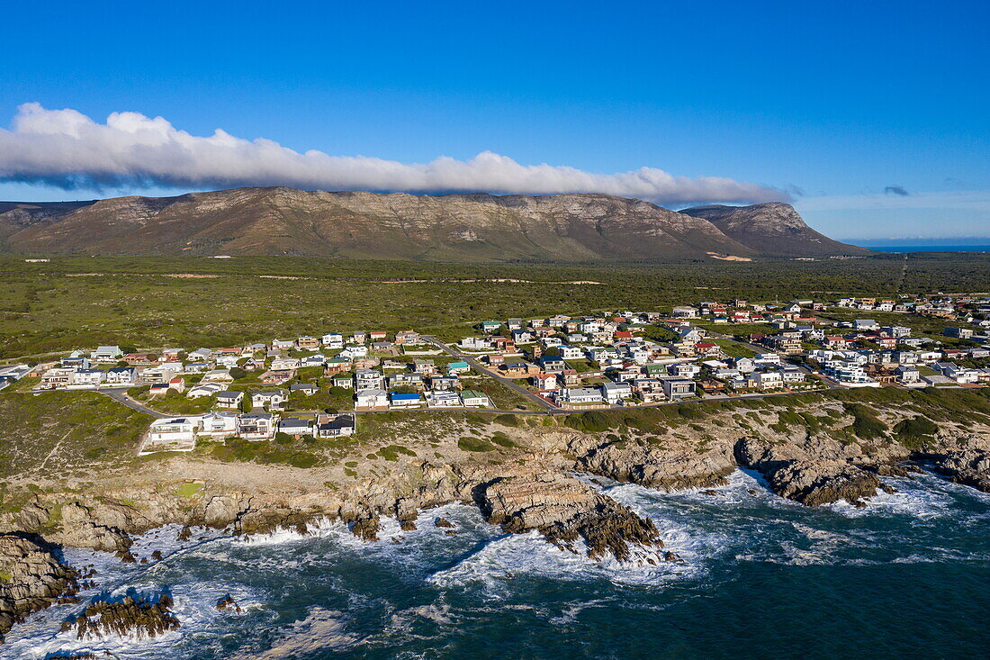 Aerial view of coast, town and mountains, Gansbaai De Kelders, Western Cape, South Africa