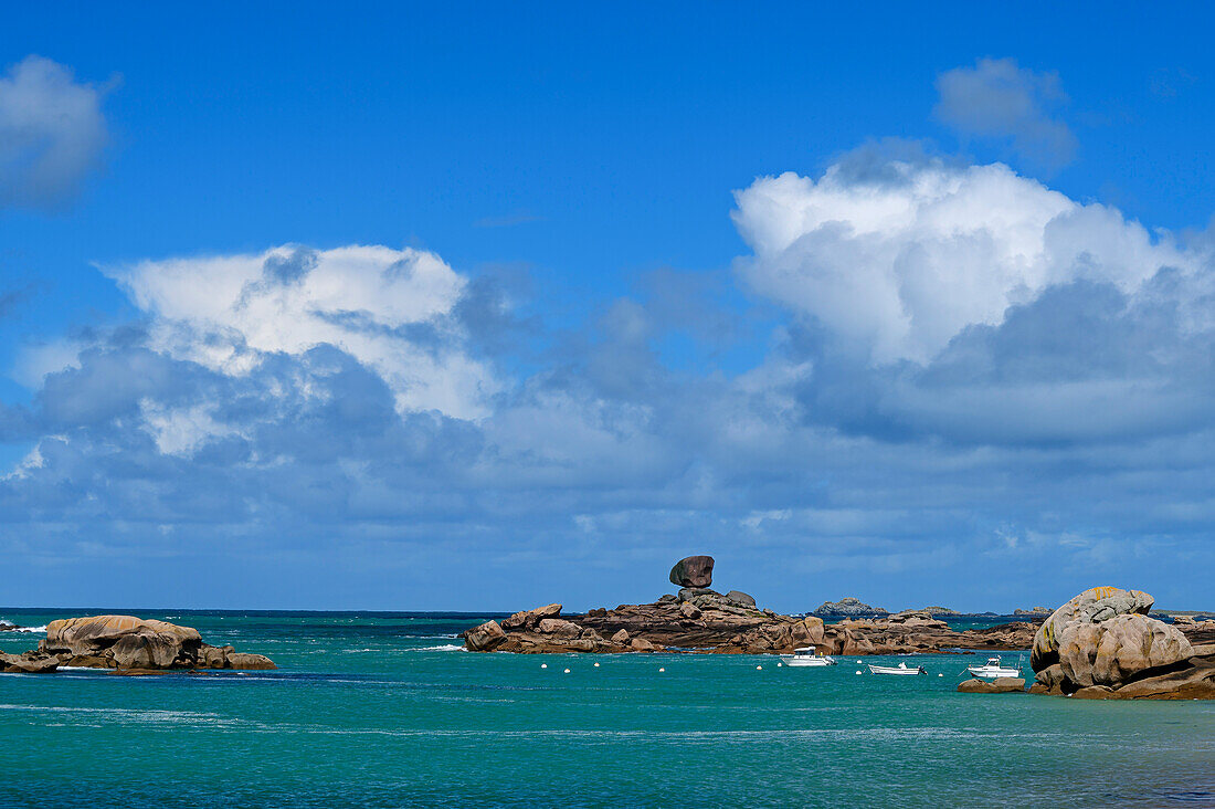 Rock formations on the coast with boats, Trégastel, Côte de Granit Rose, Brittany, France