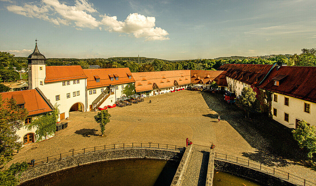 View of the courtyard of the Klaffenbach water castle with the gate building and hotel, Chemnitz, Saxony, Germany