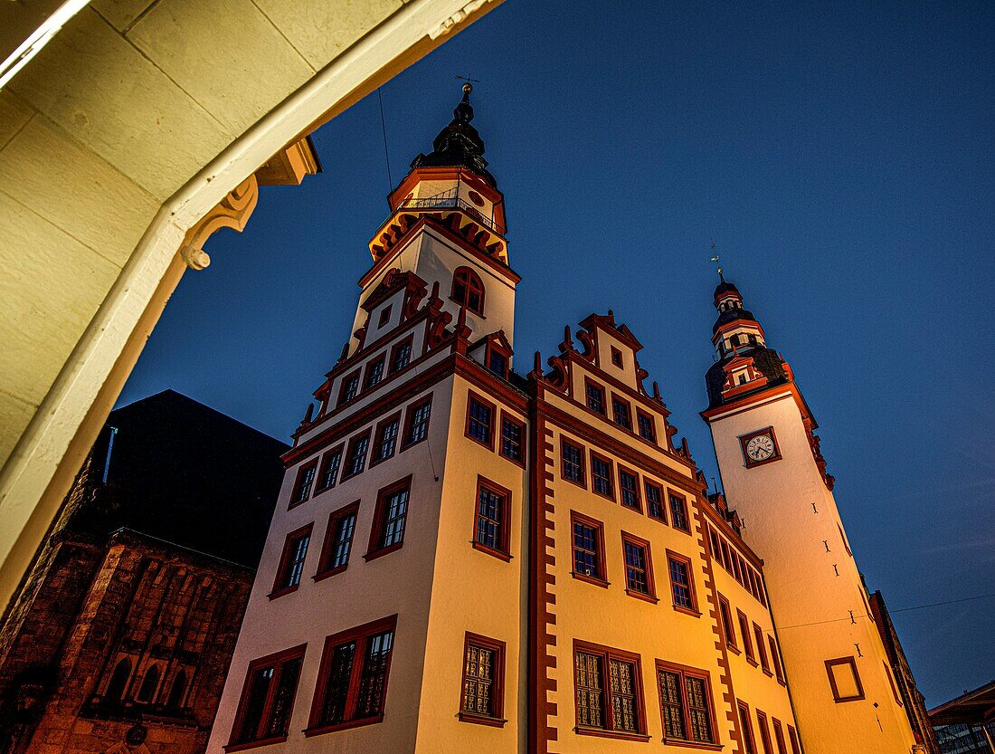 View in the evening of the towers of the Old Town Hall on the market square in Chemnitz, Saxony, Germany