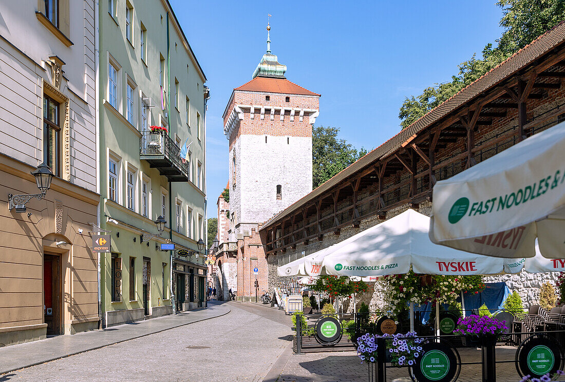 St. Florian's Gate (Brama Floriańska) and city walls in the old town of Kraków in Poland