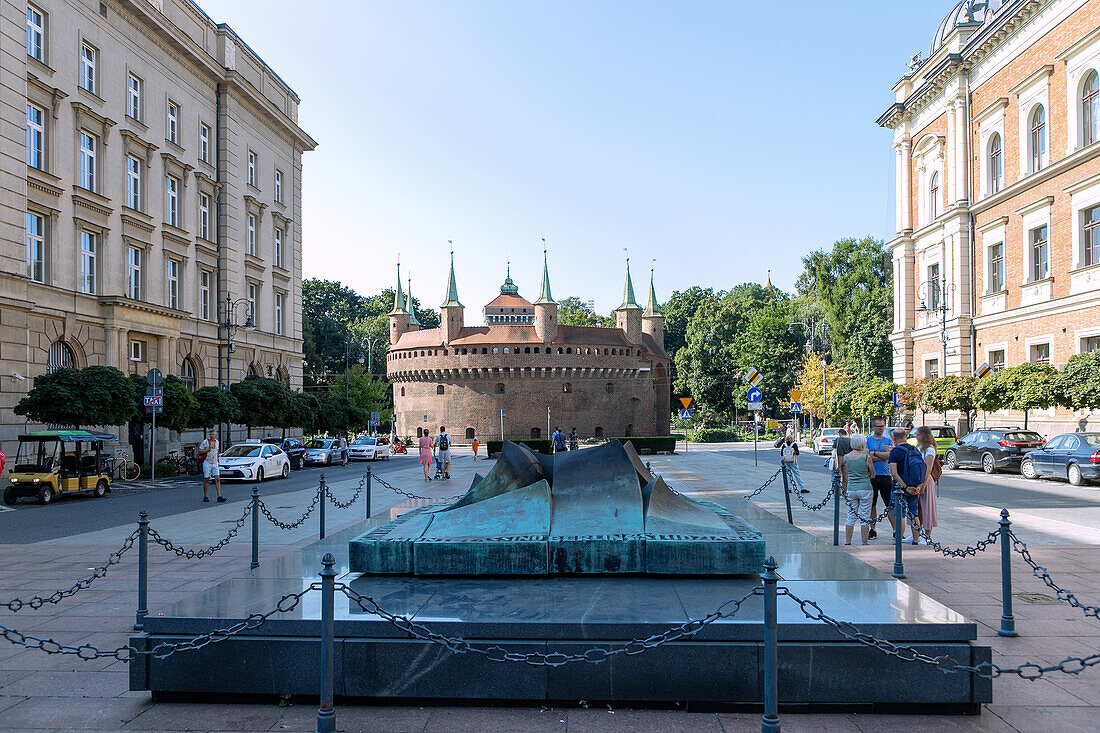 Tomb of the Unknown Soldier (Grób Nieznanego Żołnierza) at Matejko Square (plac Jana Matejki) and barbican in the Old Town of Kraków in Poland