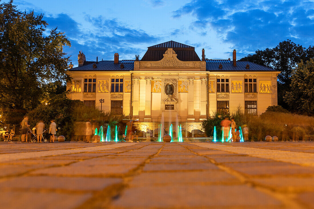 Plac Szczepański with Art Palace (Pałac Sztuki) and fountains in the old town of Kraków in Poland