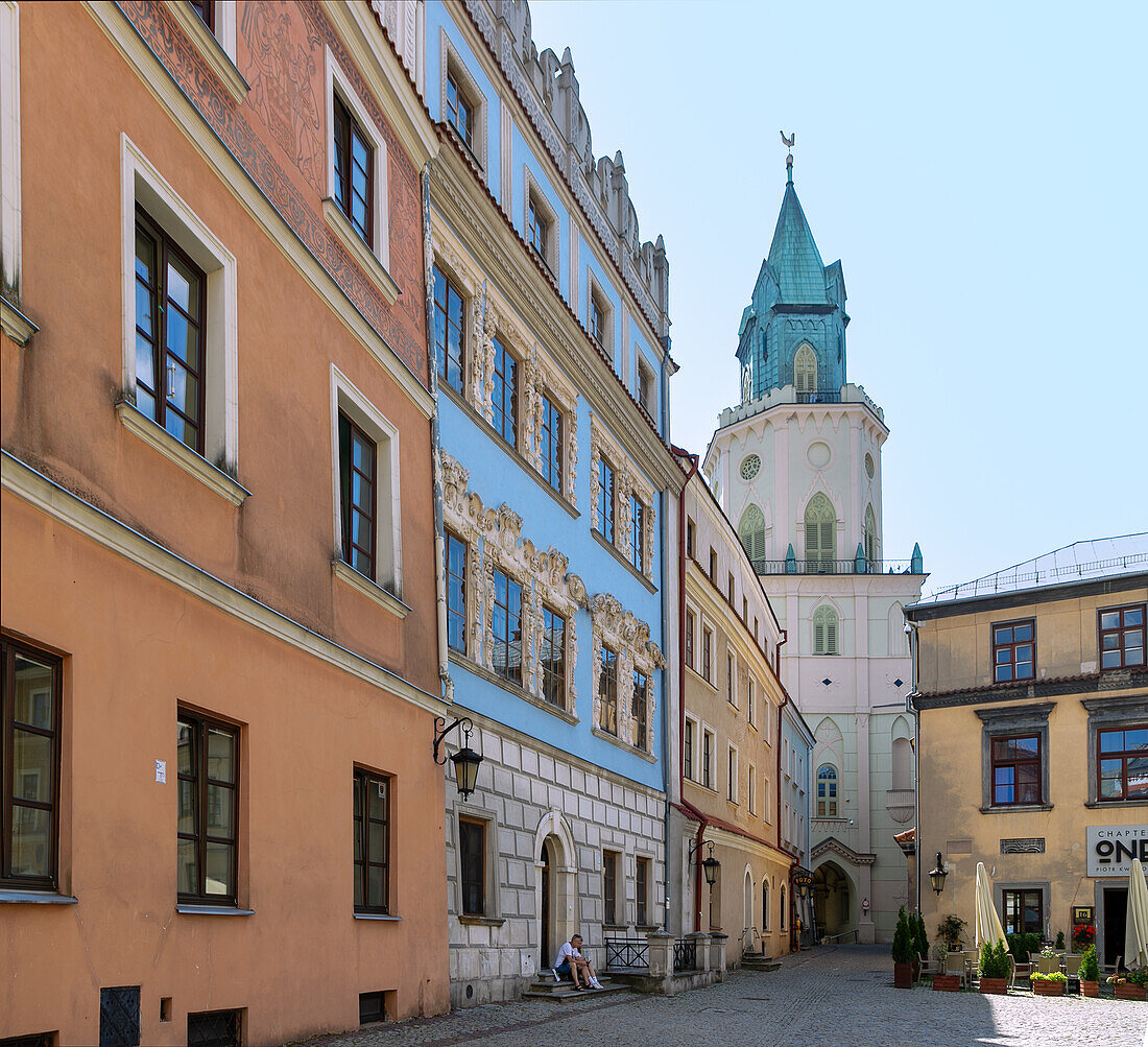 Rynek east side, Konopnica House (Konopnica House, Konopnitz House, Kamienica Konopniców) with Renaissance stucco at Rynek 12 and Trinitarian Tower (Wieża Trynitarska) with Archdiocesan Museum (Muzeum Archidiecezji Lubelskiej) in Lublin in the Lubelskie Voivodeship in Poland