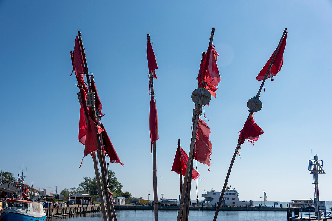 Red flags of a fishing boat, Hiddensee Island, Mecklenburg-West Pomerania, Germany