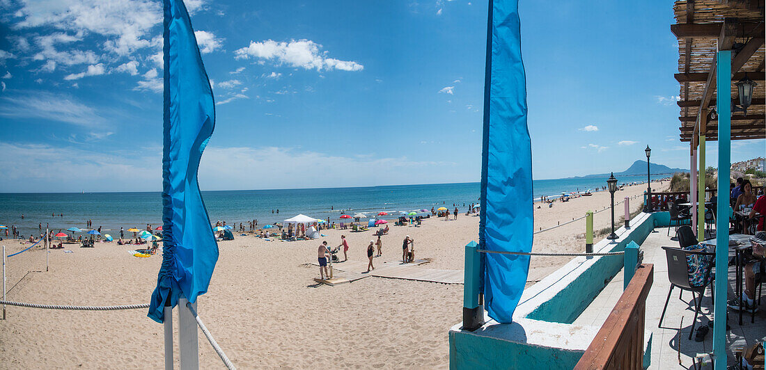 Oliva Nova dune beach, view from the beach chiringuito, on the beach and Montgo of Denia, Costa Blanca, Spain