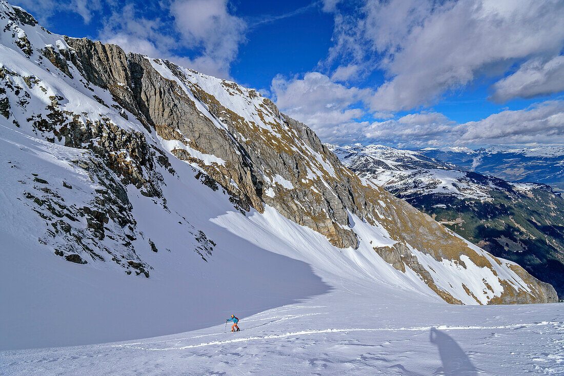 Woman on ski tour climbs to Grinbergspitze, Grinbergspitze, Tuxer Kamm, Zillertal Alps, Tyrol, Austria