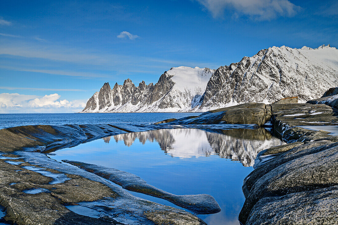 Devil's teeth reflected in tidal pools, Ersfjord, Okshornan, Tungeneset, Senja, Troms og Finnmark, Norway