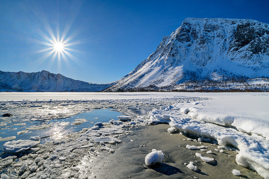 Ice floes on the beach at Ballesvika, Senja, Troms og Finnmark, Norway