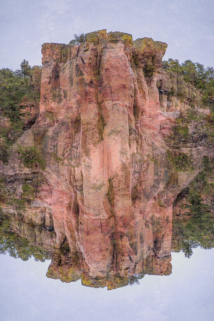 Double exposure of red rocks in the New Mexico landscape.