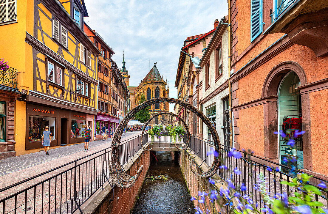 Rue de l'Église and St. Martin's Cathedral of Colmar in Alsace, France