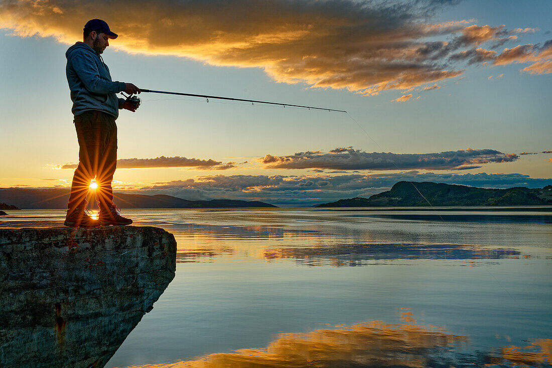 Norway, fishermen on the Gaulosenfjord near Buvika, just before Trondheim