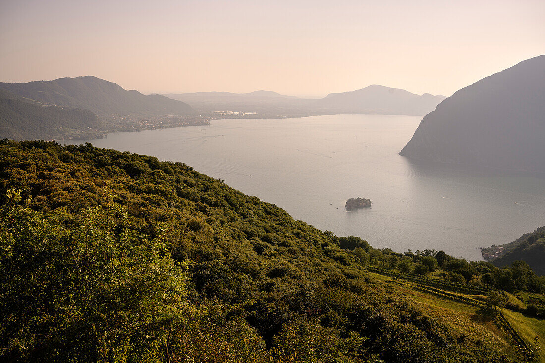 View from the island of Monte Isola to Lake Iseo (Lago d'Iseo, also Sebino) and the tiny island &quot;Isola di San Paolo&quot;, Brescia and Bergamo, Northern Italian Lakes, Lombardy, Italy, Europe