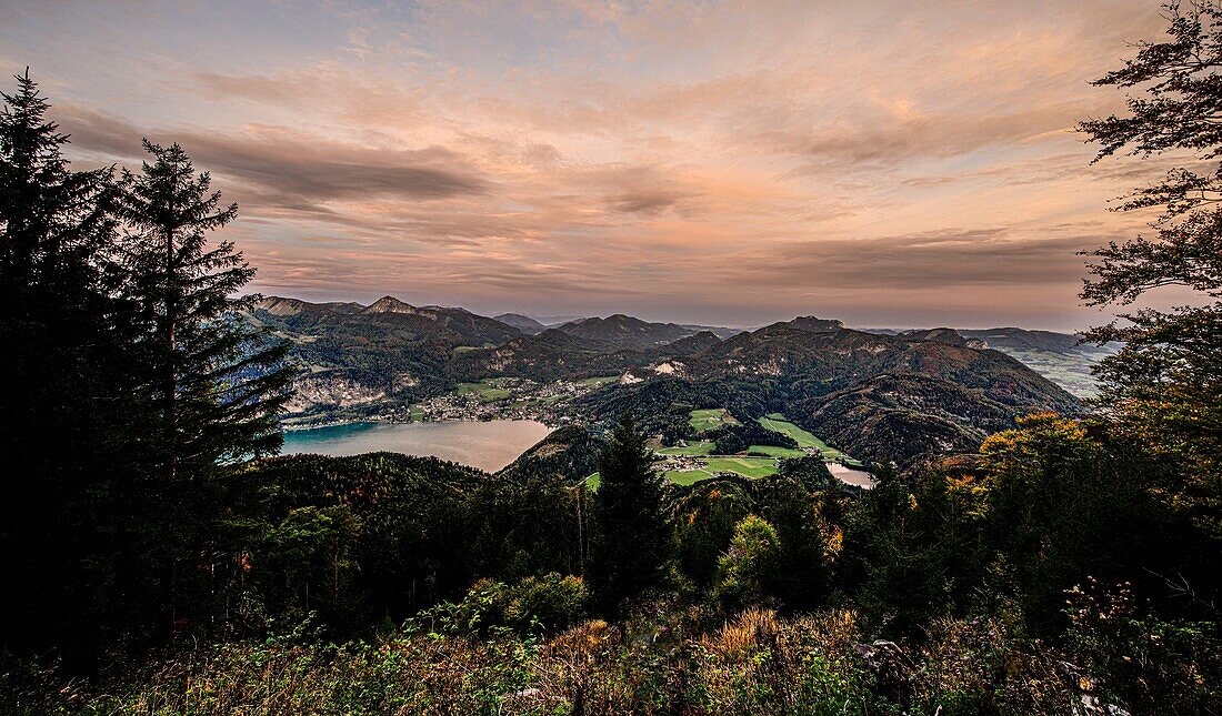 Early morning view from Schafberg to St.Gilgen am Wolfgangsee and the Alpine mountains, Salzburg state, Austria