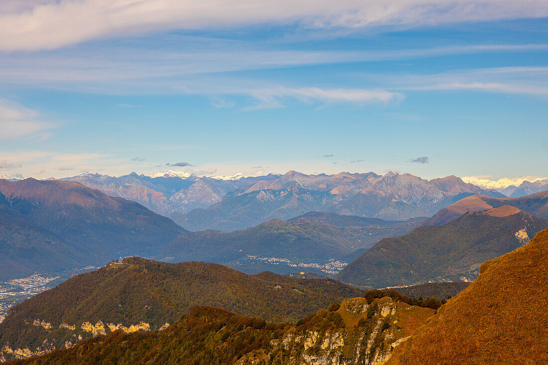 Aerial View over Beautiful Mountainscape with Clouds in a Sunny Day in Valley in Ticino, Switzerland.