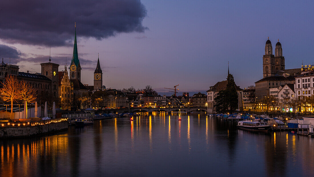 Evening atmosphere with a view of Zurich's old town; Zurich, Switzerland