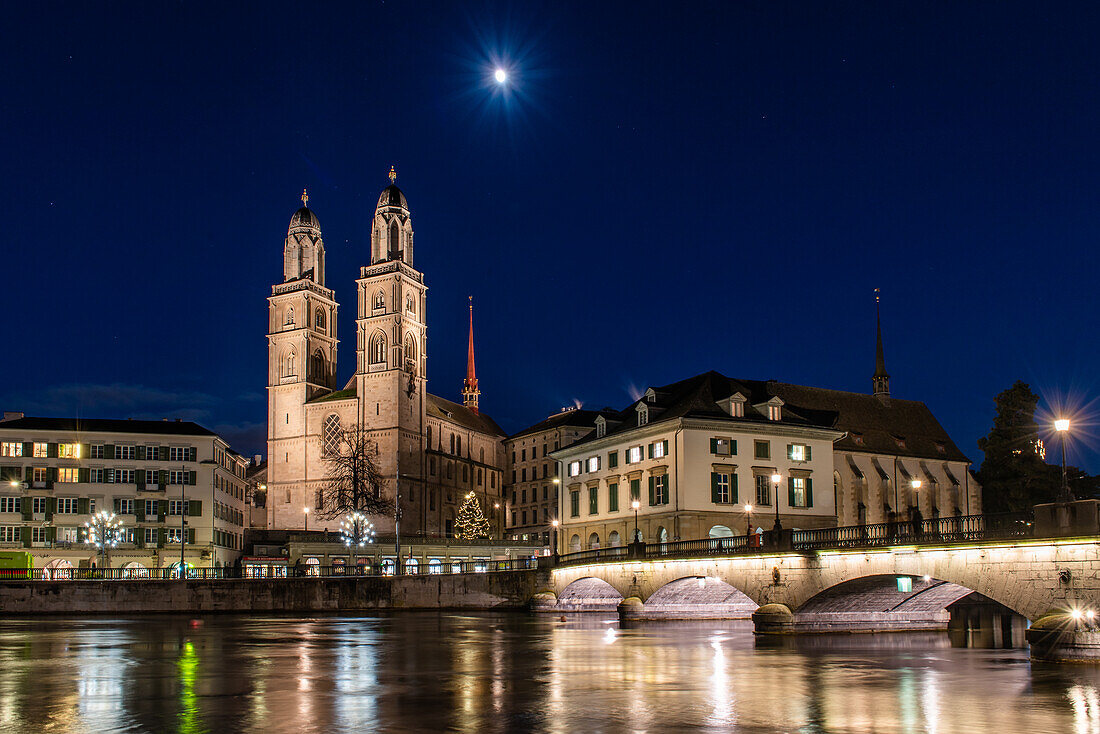 Zurich Grossmünster in the moonlight; Zurich, Switzerland