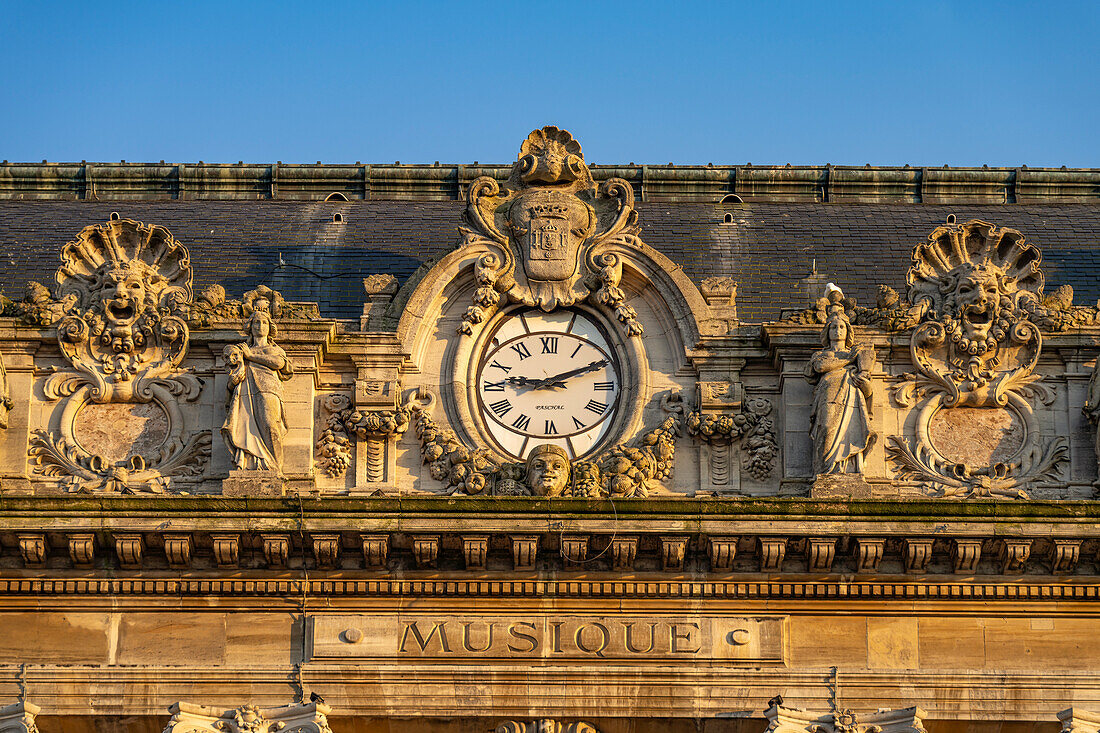 Clock and details of the Theater of Calais, France