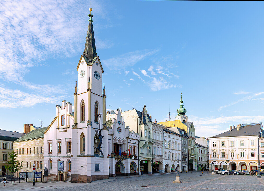 Market square (Krakonošovo náměstí, Krakonosovo Namesti) with town hall, parish church and arcade houses in Trutnov (Trautenau) in East Bohemia in the Czech Republic