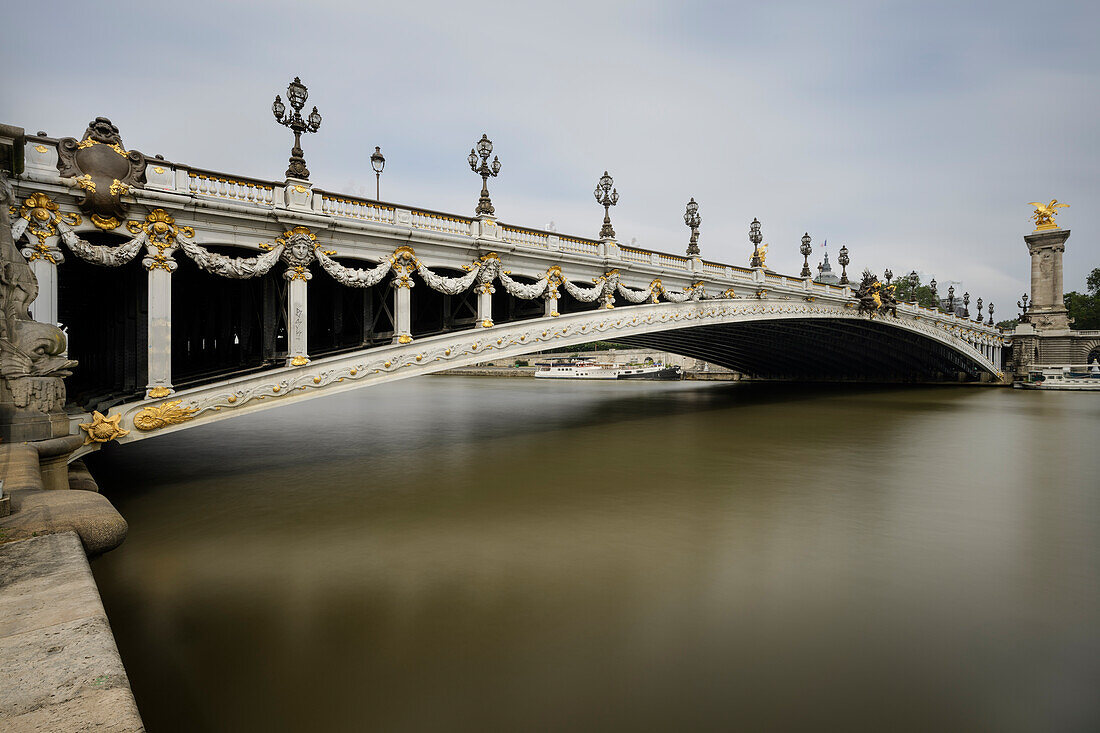 Artfully designed arch bridge Pont Alexandre III, Seine banks, Paris, Île-de-France, France, Europe, UNESCO World Heritage