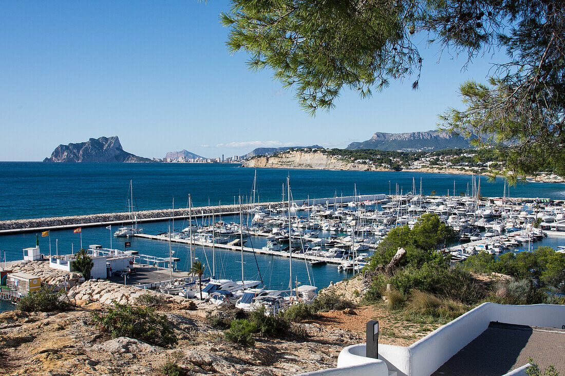 Moraira, harbor, overlooking Calpe and the Penon de Ifach, Costa Blanca Spain