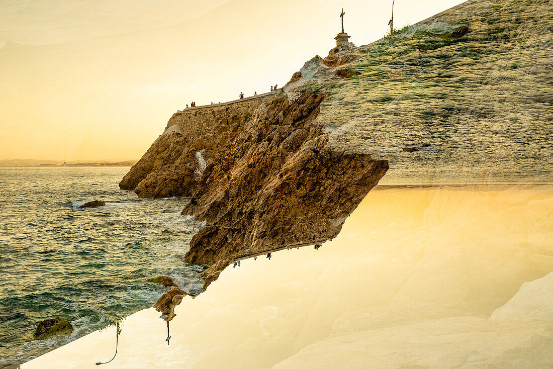 Double exposure of the rocky coast and Mediterranean sea in Nice, France.