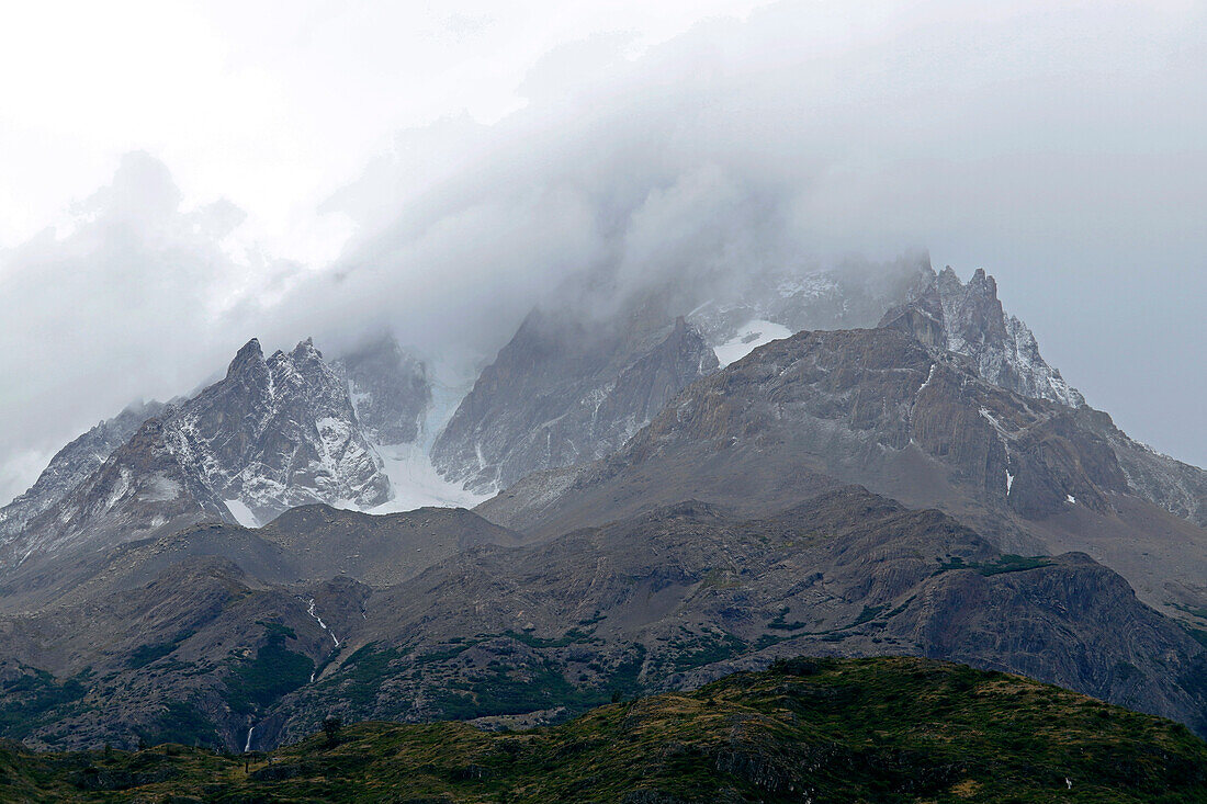 Chile; Southern Chile; Magallanes Region; Mountains of the southern Cordillera Patagonica; Torres del Paine National Park; Rain clouds over Cerro Paine Grande
