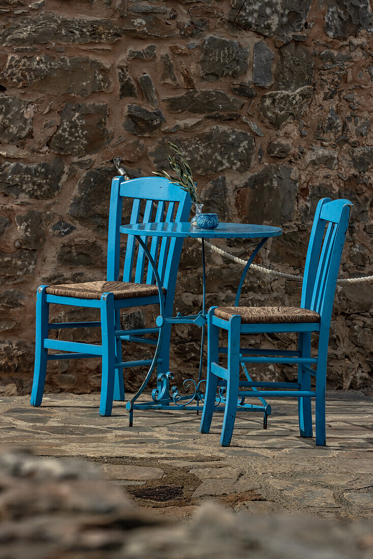 Blue table and blue chairs in Greece
