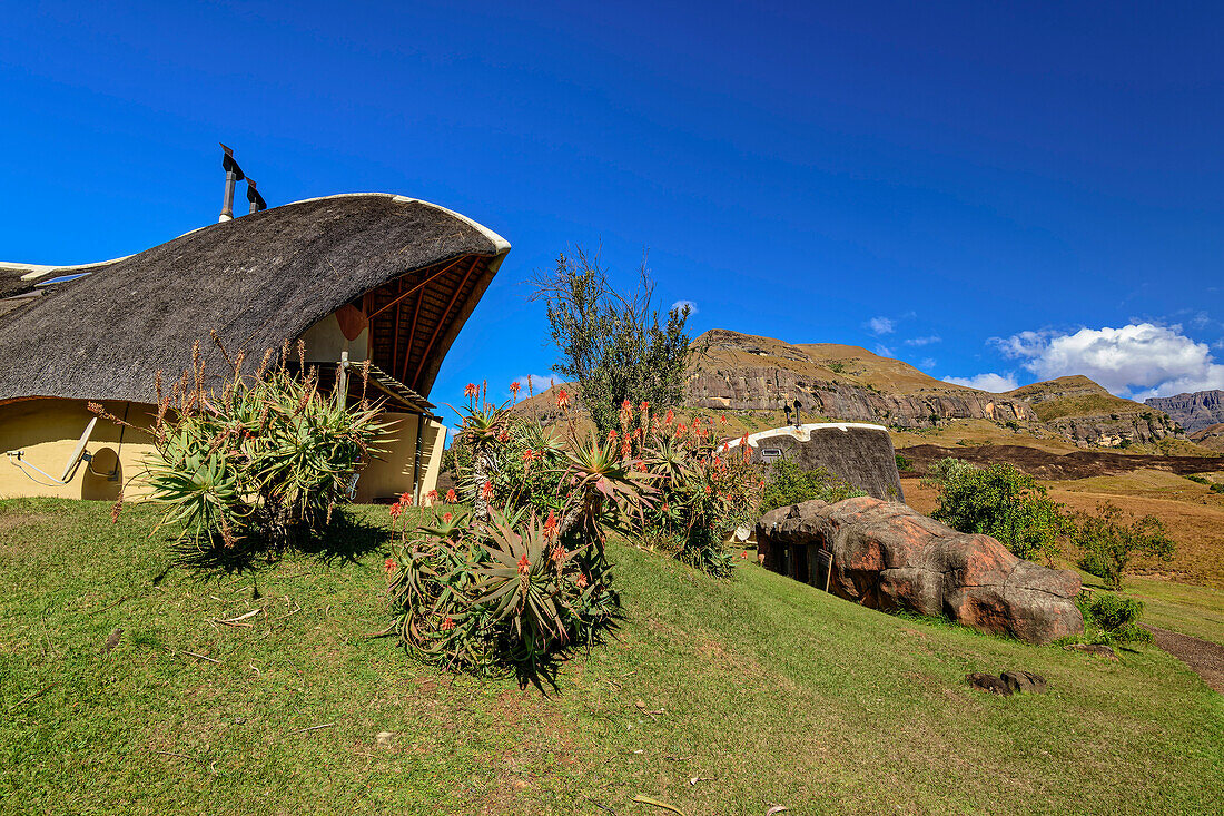 Thatched lodges, Didima, Cathedral Peak, Drakensberg, Kwa Zulu Natal, UNESCO World Heritage Site Maloti-Drakensberg, South Africa