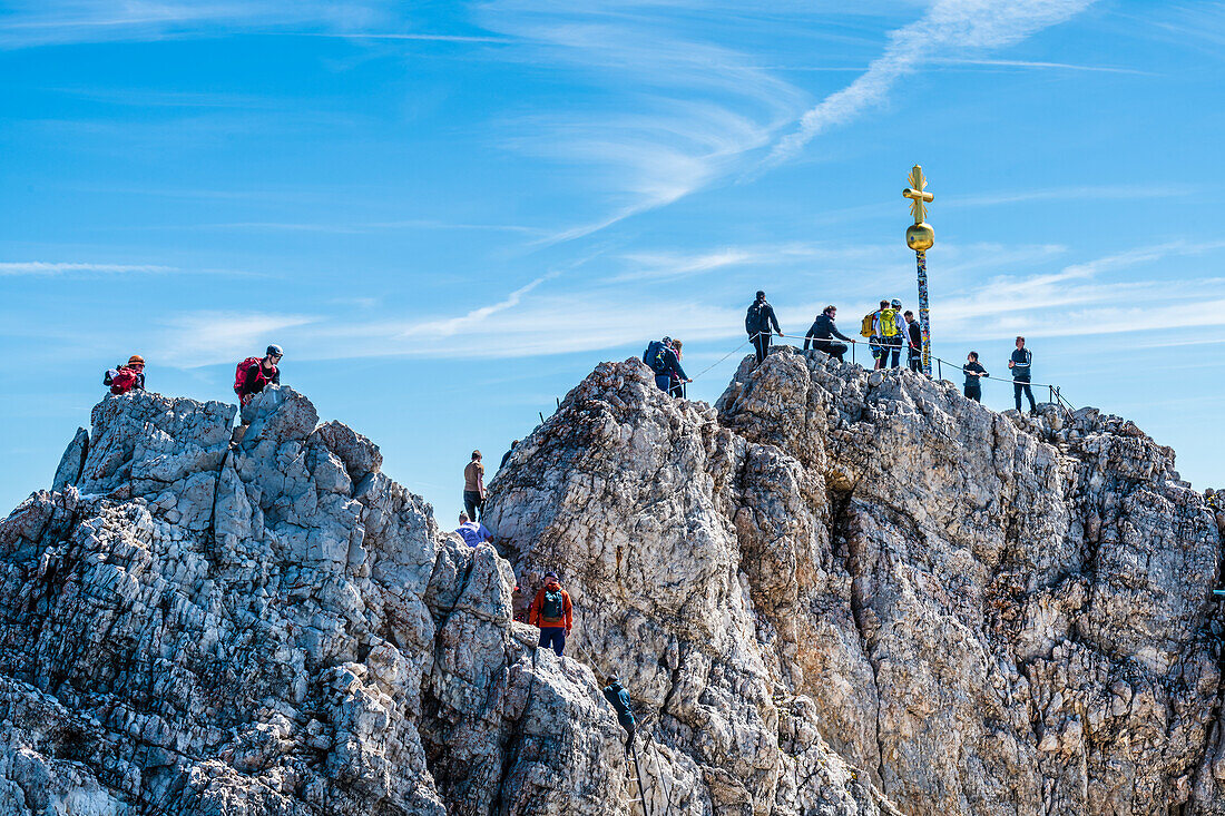 Climbers, summit cross, Zugspitze, Partenkirchen, Bavaria, Germany