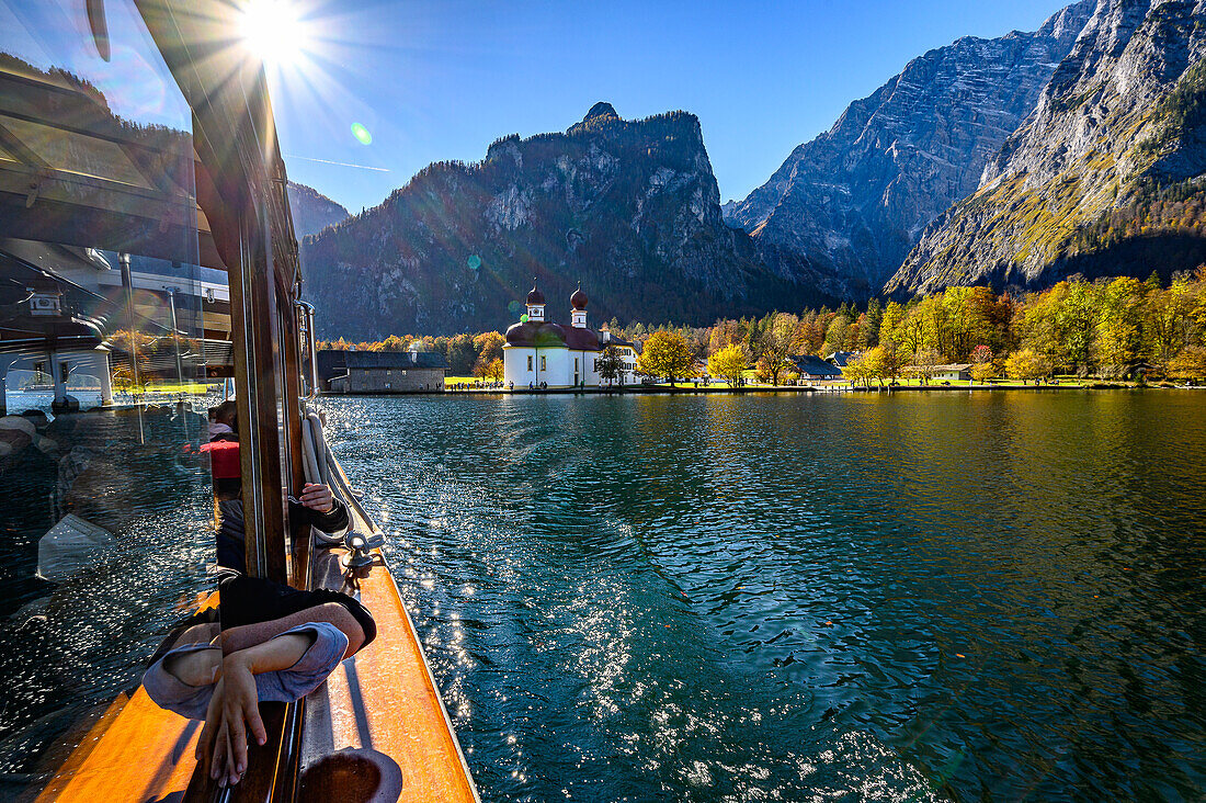 View from wooden boat, tourist boat trip/shipping on the Königssee, Königssee with St. Bartholomä Church in front of Watzmann east wall, Königssee, Berchtesgaden National Park, Berchtesgaden Alps, Upper Bavaria, Bavaria, Germany