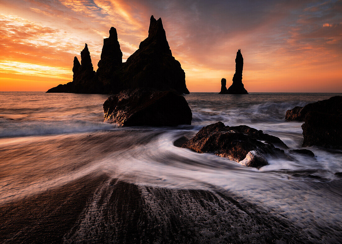 Rock pinnacles at sunrise on Black Sand Beach, Iceland