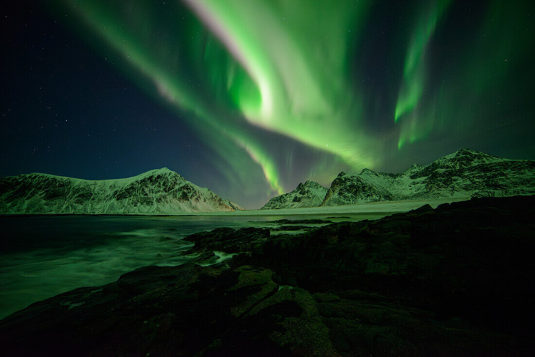 Northern lights over Flakstad Beach, Lofoten, Norway