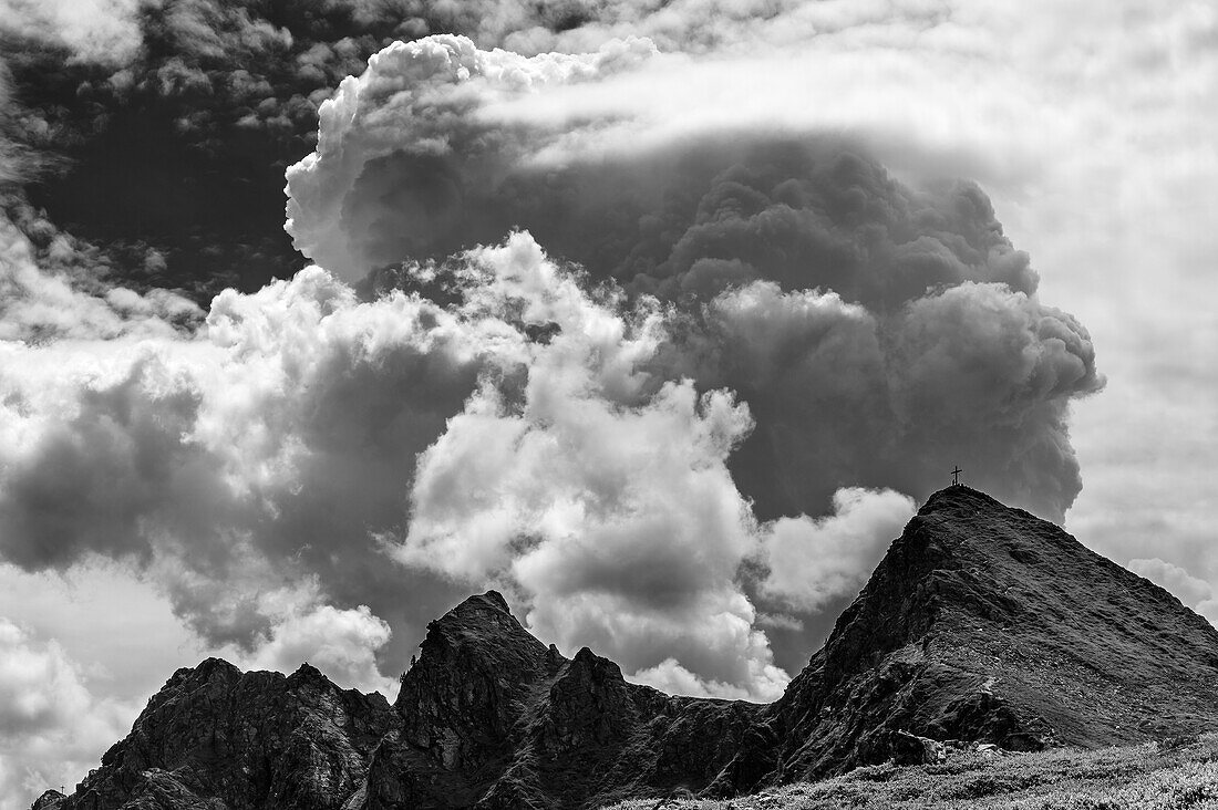 Towers of clouds over the peaks of Standkopf, Kitzbühel Alps, Tyrol, Austria