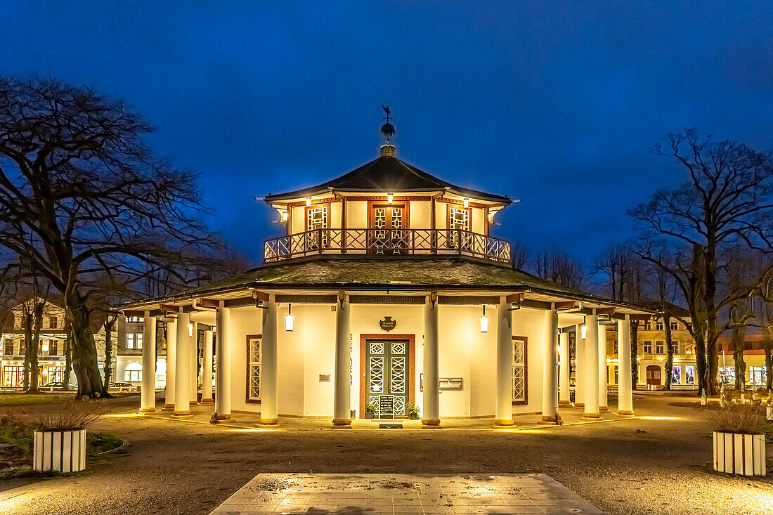  White pavilion with restaurant in Bad Doberan at dusk, Mecklenburg-Western Pomerania, Germany \n\n\n 
