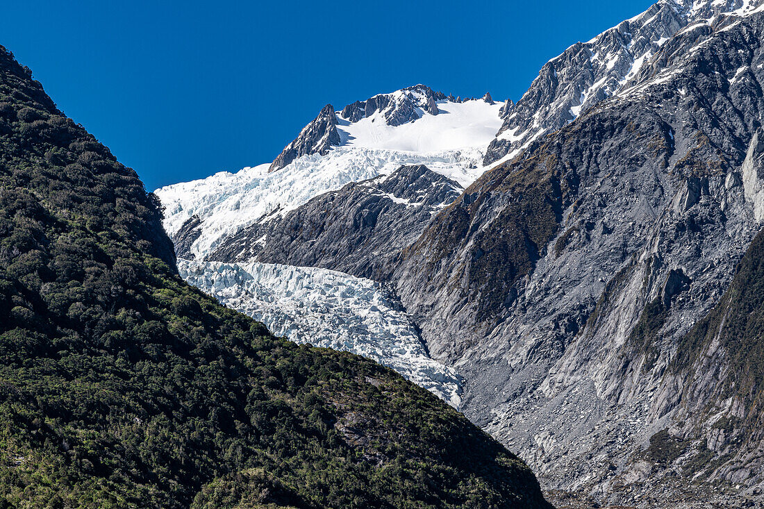 Views of the Franz Joseph Glacier from different areas of the trail to the viewing area.