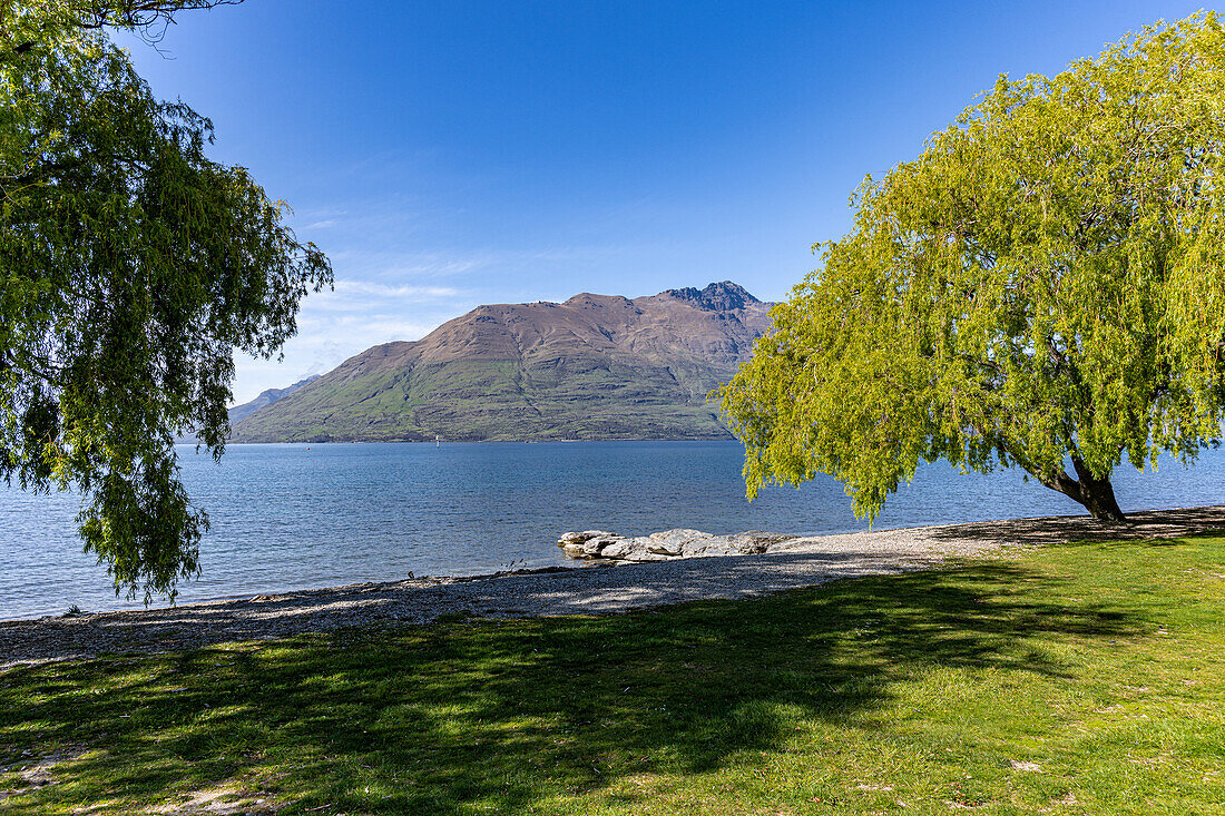 Views of Lake Wakatipu and the mountain peaks next to Queenstown New Zealand