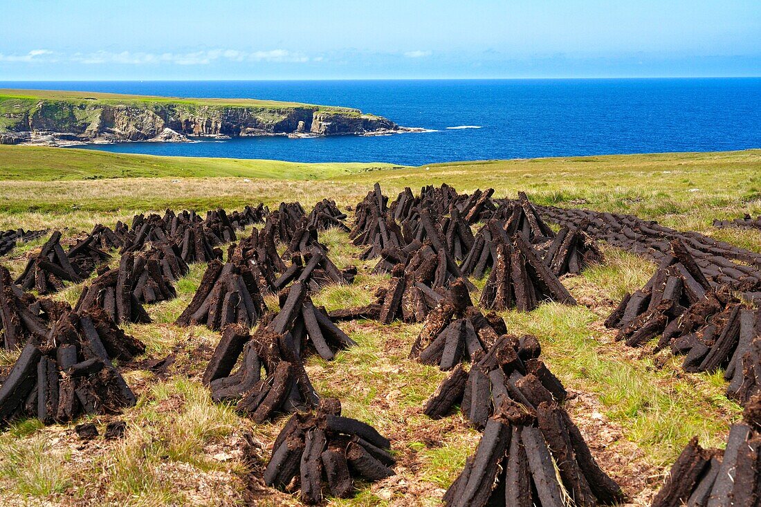 Ireland, County Mayo, North West Coast, Glenloss Point, looking north towards the Atlantic, peat bricks