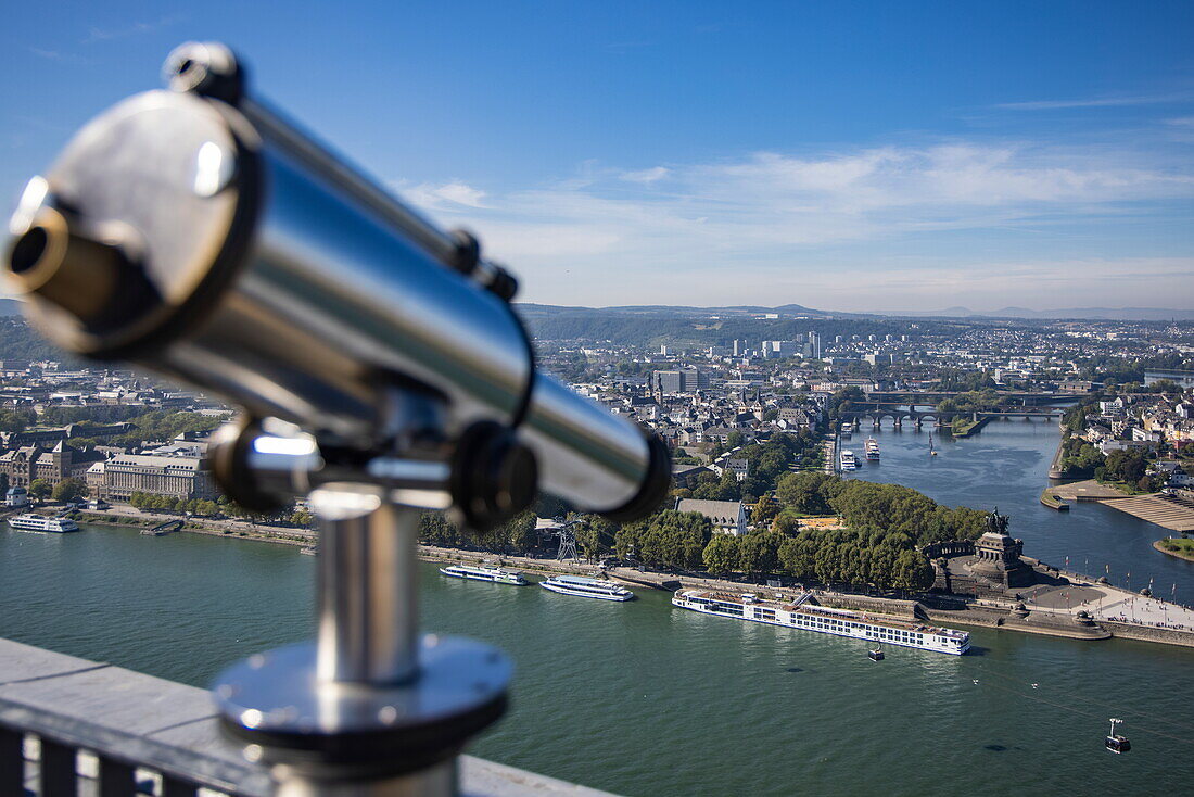 Deutsches Eck at the confluence of the Moselle and Rhine seen from the Ehrenbreitstein Fortress with coin-operated telescope in the foreground, Koblenz, Rhineland-Palatinate, Germany, Europe