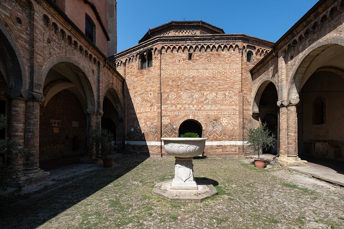View of the mosaics of the outer wall of the Basilica of Santo Stefano in the courtyard of the monastery, Bologna, Emilia Romagna, Italy, Europe