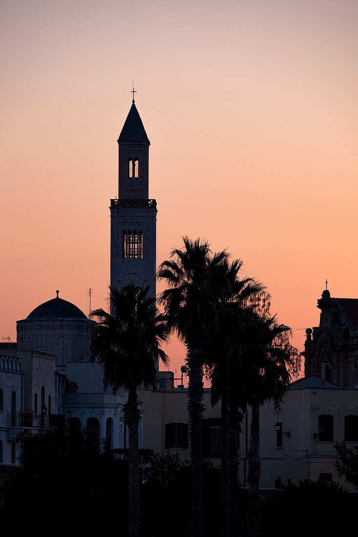 View of the church tower of the San Sabino Cathedral backlit at sunset, Bari, Apulia, Italy, Europe