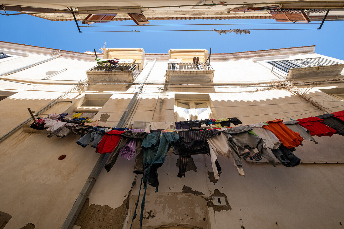 View of a clothesline in an alley in the old town of Termoli, Campobasso, Molise, Abruzzo, Italy, Europe