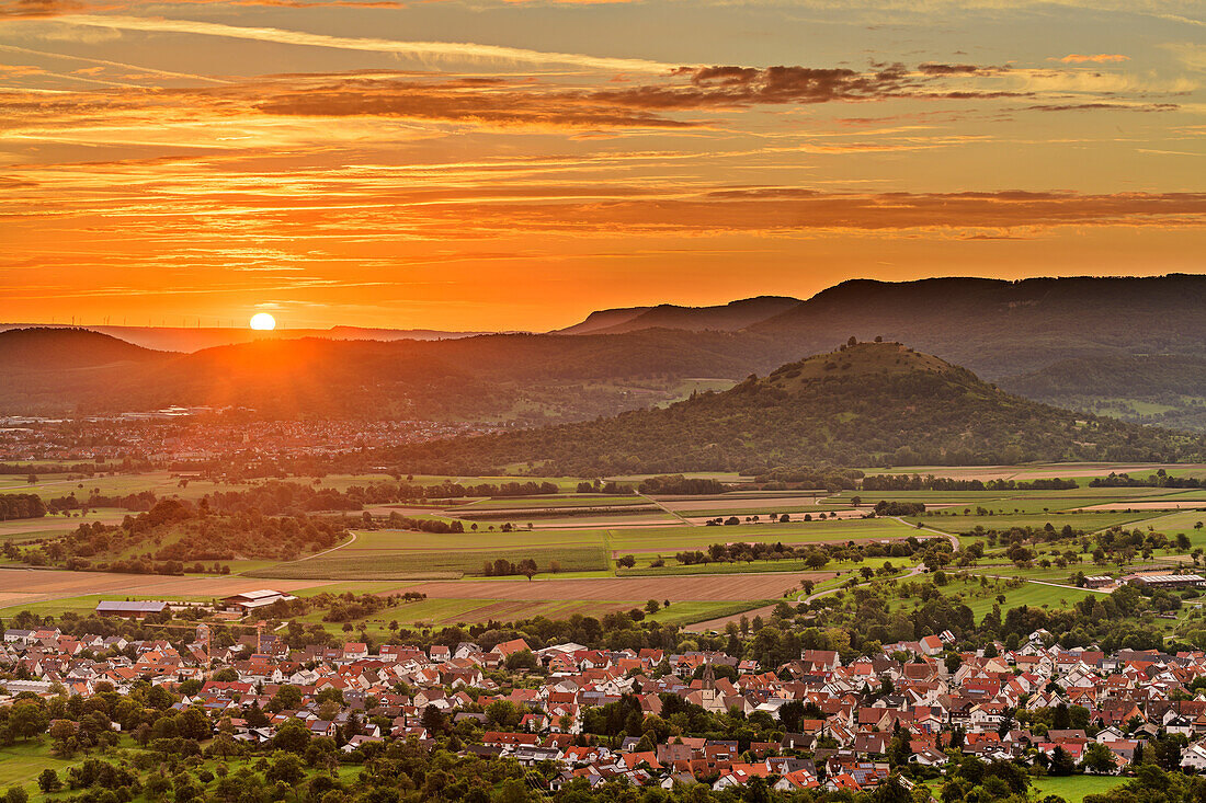 Cloudy atmosphere at sunrise over Bissingen and Weilheim an der Teck, from Hörnle, Teck, Swabian Alb, Baden-Württemberg, Germany