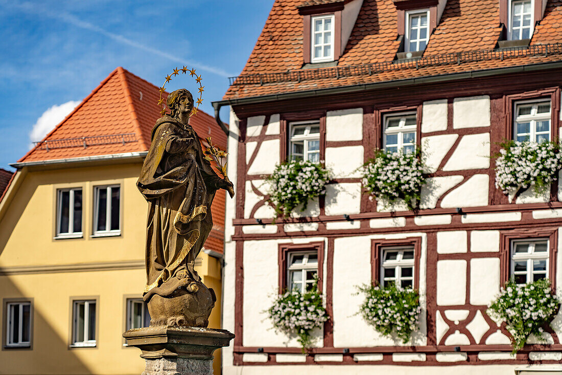  Statue of Mary Immaculata on the market square in Volkach, Lower Franconia, Bavaria, Germany 