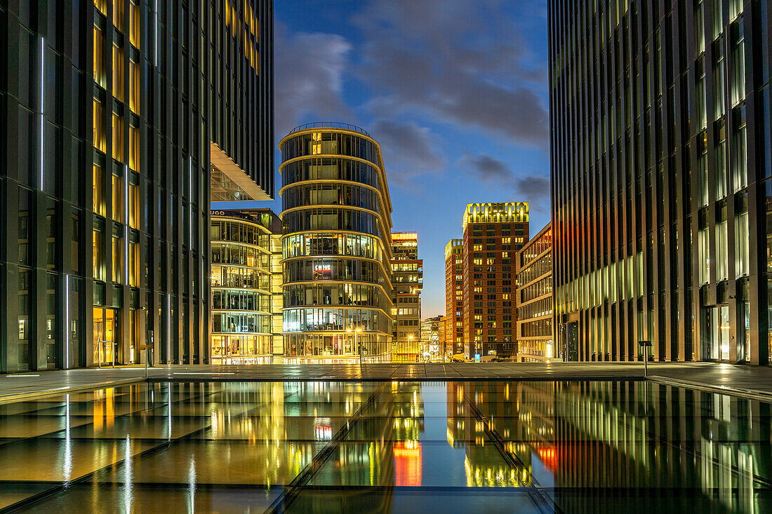  Modern high-rise architecture at the Medienhafen district in Düsseldorf at dusk, North Rhine-Westphalia, Germany, Europe  