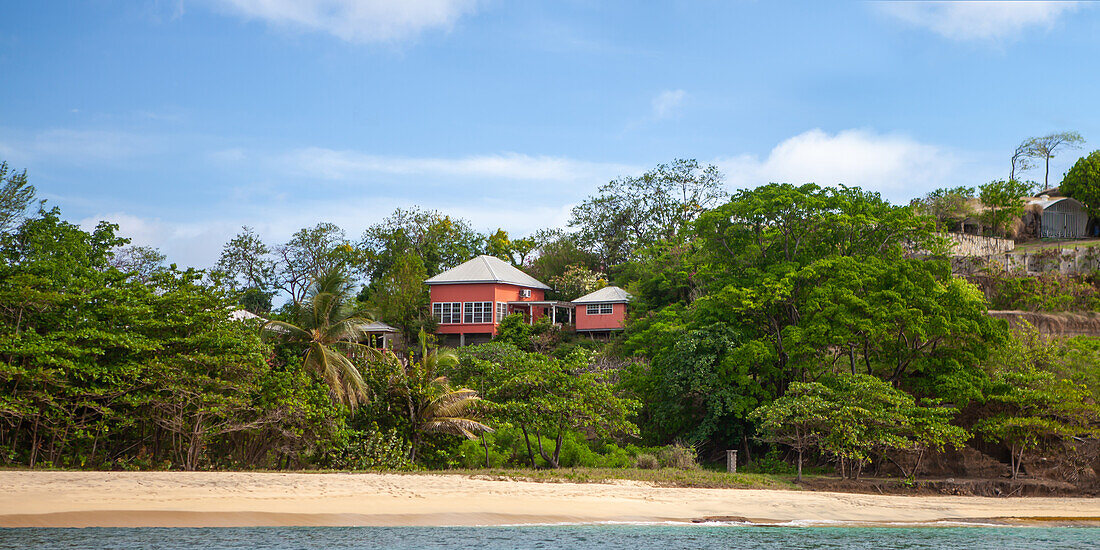  Colorful house on the Caribbean coast south of St. George&#39;s, Grenada, Caribbean 